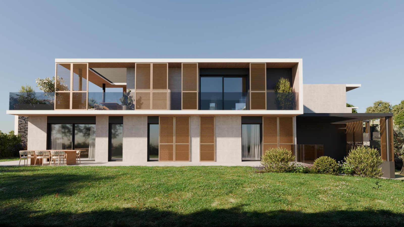 Das Doppelhaus von der Wiese aus, mit den Terrassen im ersten Stock